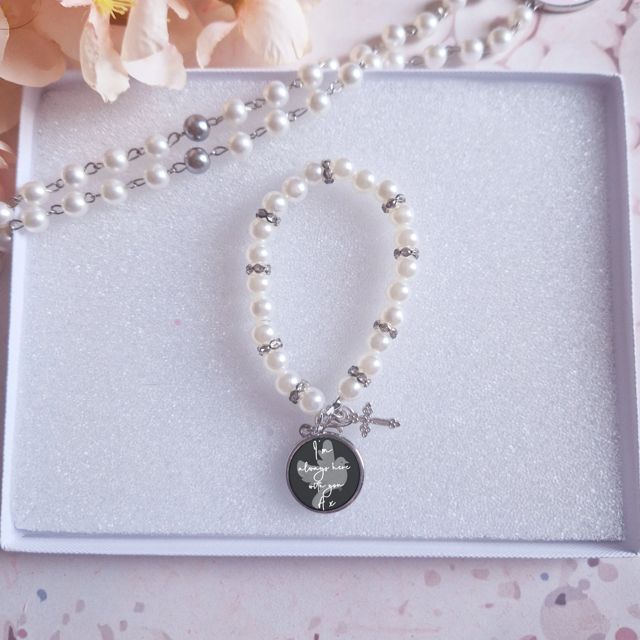 Personalised rosary bead bracelet with a dove pendant